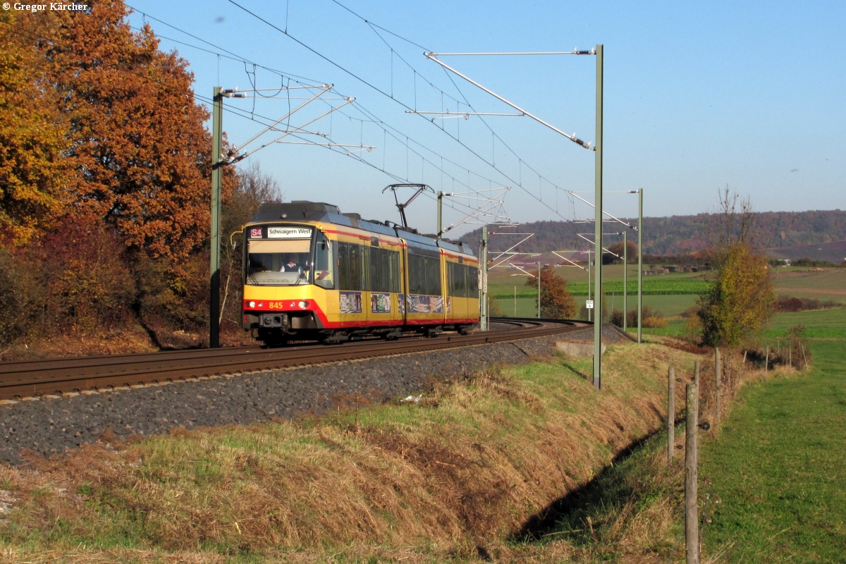 Ex RegioBistro 845 mit Werbung für die PSD-Bank und BG Karlsruhe bei Wieslensdorf, 02.11.2011.