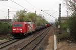 185 399 mit einem gemischten Güterzug bei Karlsdorf, 04.04.2012. Mein bis heute leider einziges Bild von dieser Werbelok. Das Bild entstand vom Bahnsteigende.