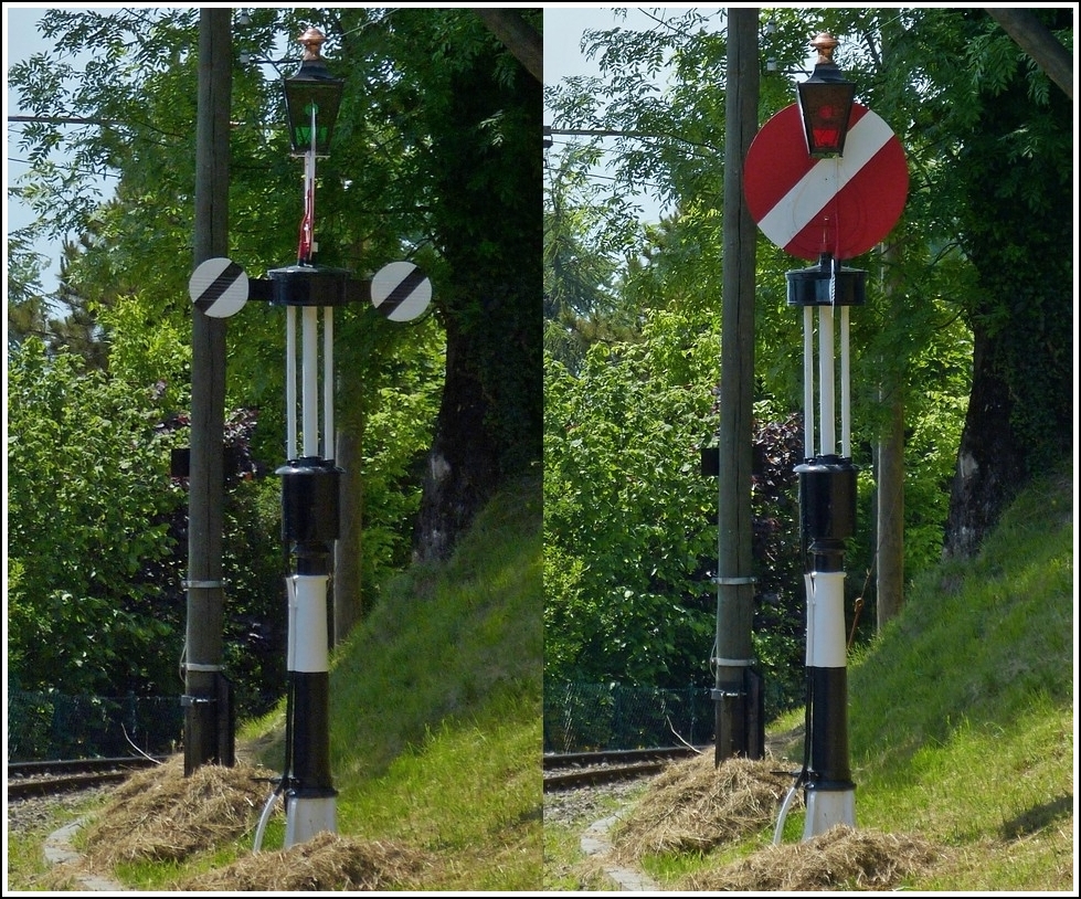 Die hippsche Wendescheibe, auch Hipp'sche Wendescheibe geschrieben, ist ein historisches Eisenbahnsignal. Das automatische und visuelle Signal diente als Vor- und Hauptsignal. Dieser Signaltyp wurde 1862 vom Erfinder und Uhrmacher Matth�us Hipp speziell f�r die Schweiz entwickelt. Das Signal wurde nach ihm benannt und war lange vor den Fl�gelsignalen in Gebrauch. Die hippsche Wendescheibe ist auf einem Mast montiert. Sie besitzt eine gro�e rote Scheibe mit wei�em Diagonalbalken und unterhalb, im rechten Winkel dazu angeordnet, zwei kleine wei�e Scheiben mit schwarzem Diagonalstrich. Die Scheibe ist drehbar und zeigt entweder die rote Tafel, welche  Halt  signalisiert, oder die beiden wei�en Tafeln, welche  Fahrt frei  anzeigen. Die R�ckseite der roten Hauptscheibe ist wei� mit einem schwarzen Diagonalstrich. Damit ist das Signal eindeutig einer Fahrtrichtung zugeordnet.  Die zwei kleinen Scheiben gleichen auch die Angriffsfl�che f�r den Wind aus und damit die aufzuwendende Stellkraft. Der Antrieb funktionierte �ber ein Gewicht im Signalmast, welches nach ca. 200 Scheibenumdrehungen wieder aufgezogen werden musste. Das Signal wurde mittels einer Batterie elektromagnetisch ausgel�st (elektrischer Schwachstromimpuls) und war bei Sturm und im Winter sicherer als die Drahtz�ge. Nach einem Stromimpuls erfolgte die Drehung der Scheibe immer in eine Richtung, das hei�t, dass nach der Drehung um 90 Grad beim �ffnen des Signals die Scheibe zum Schlie�en nicht einfach um 90 Grad zur�ckgedreht wurde, sondern 270 Grad bis in die Ausgangsstellung in gleicher Drehrichtung weiterlief. Bemerkenswert war auch, dass die hippschen Wendescheiben von Anfang an mit einer elektrischen R�ckmeldung der Signalstellung zur ausl�senden Station ausgestattet waren. (Quelle: Wikipedia) 27.05.2012 (Hans)
