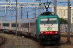 NMBS 2810 treft mit ein  EuroCity   aus Rotterdam nach Bruxelles-Midi am 11 Juni 2025 in Breda ein.