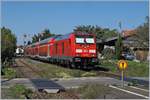 Die DB 245 035 schiebt ihren RE 27668 , unterwegs von Lindau HbF nach Laupheim West in Nonnenhorn Richtung Friedrichshafen Stadt.