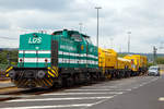 
Die 293 511-2 (92 80 1293 511-2 D-LDS) des Eutiner Eisenbahnunternehmen LDS GmbH (LDS steht für Logistik, Dienstleistungen und Service) steht am 07.07.2019 mit dem Drehhobel D-HOB 4.0 (D-HOB 2500) der Schweerbau beim ICE-Bahnhof Montabaur. 

Die Einheit Drehhobel D-HOB 2500 IV (D-HOB 4.0) besteht aus dem Steuerwagen (Schweres Nebenfahrzeug-Nr. D-SBAU 99 80 9580 003-8) einem ursprünglichen GAF 100 R welches keinen eigenen Antrieb mehr hat, dem Technologieträger D-HOB 2500 IV bzw. D-HOB 4.0 (Drehhobel) Schweres Nebenfahrzeug-Nr. D-SBAU 99 80 9427 020-9) und dem Spänetransportwagen STW 01 Schweres Nebenfahrzeug-Nr. D-SBAU 99 80 9552 100-6. Zudem war noch der Flachwagen 27 80 3302 030-8 D-WSG der Gattung Ks mit aufgesetzten Werkstatt- und Aufenthaltscontainer dort abgestellt.
