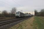 Rail Adventure 111 082 zieht ein �berbringung von zwei Reisewagen f�r Israel Railways bei Kaarst von Neuss nach Krefeld am 22 Januar 2025.