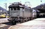 144 502-2 in Berchtesgaden mit Nahverkehrszug am 23.03.1981.