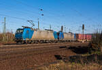Die 185 535-2 zieht am 09.03.2014 die kalte 145-CL 203 (145 523) und einem KLV-Zug bei Koblenz-L�tzel in Richtung K�ln.
