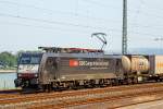   Die von der SBB Cargo International angemietete MRCE Dispolok ES 64 F4-282 / 189 282-7 (91 80 6189 282-7 D-DISPO Class 189-VK) fährt am 03.07.2015 mit einem Containerzug durch