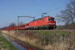 Mit der leeren Ford-PKW Zug nach Craiova in Rumänien passiert am 18 März 2026 DBC 193 358 Tilburg Oude Warande und wird vom offenbarer Stelle auf den Chip gesetzt.