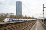  Zwei gekuppelte fünfteilige Bombardier Talent 2 (BR 9 442) der National Express Rail GmbH (NX Rail) erreichen am 26.11.2016, als RE 7  Rhein-Münsterland-Express  (Krefeld - Köln -