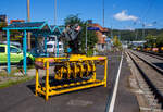 Bahnschwellenleger für Bagger vom Typ RUS05 im Geräteständer, der Joseph Hubert GmbH & Co.