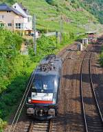 Die MRCE Dispolok ES 64 U2-098 182 598-3 fährt am 22.06.2014 als Lokzug (solo), auf der Moselstrecke (KBS 690), durch Kattenes in Richtung Trier.