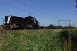 Rückfahrt von 275 618 mit ein beinahe ganz leeren KLV durch Oisterwijk am 28 Juni 2019.