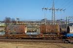 Schwerlastwagen Samms (Drehgestellflachwagen mit sechs Rads�tzen) als Privatwagen der Firma Gontermann-Peipers, Siegen (Walzen und Gussprodukte), beladen mit Gu�kokillen.