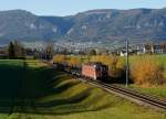 SBB: Trotz selbem E-Loktyp und gleicher Fotostelle sind die beiden Aufnahmen wegen der Wetterlage sehr unterschiedlich ausgefallen.