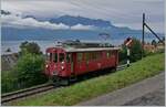 Der Blonay-Chamby Bahn RhB Bernina Bahn ABe 4/4 I N° 35 hat Blonay verlassen und passiert das Einfahrsignal von Blonay, eine  Hippsche  Wendescheibe.