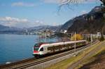 Das war mir den Nachschu� wert:   Stadler FLIRT  RABe 523 024 der SBB (RER Vaudois) als S1 (Villeneuve - Montreux - Vevey - Lausanne -  Yverdon-les-Bains), f�hrt am 26.02.2012 bei Clos du Moulin am