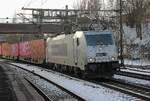 Am 20 Februar 2026 durchfahrt Metrans 386 037 samt deren KLV Hamburg-Harburg i8ns Hafenrevier.